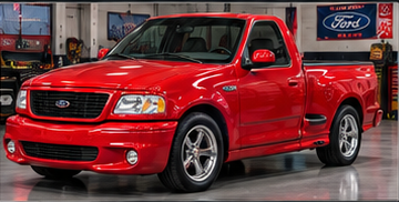 Red 2000 Ford Lightning in the shop